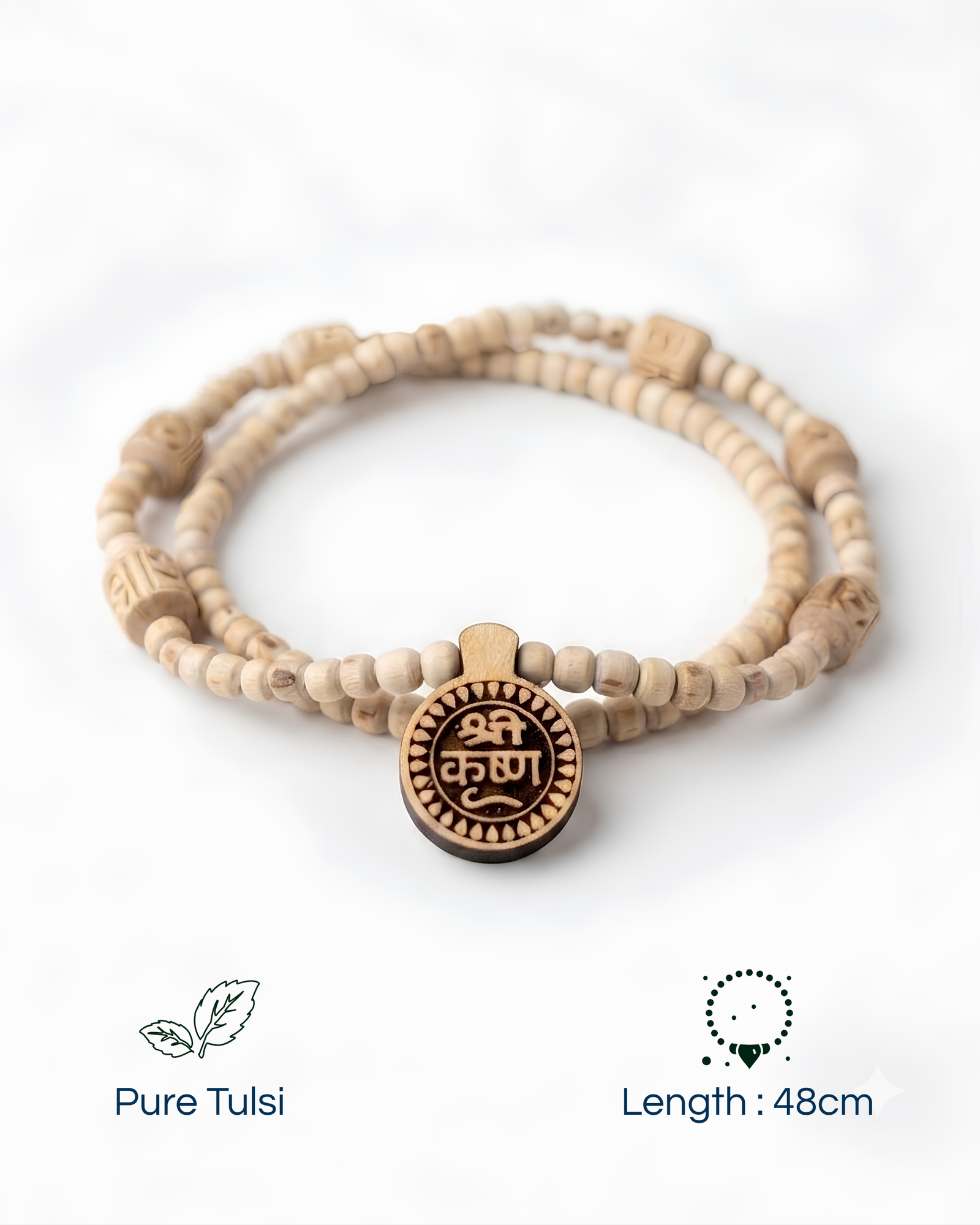 Wooden prayer beads (mala) with a circular carved pendant on a white background.