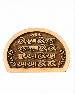 Close-up of a bronze coin with an ornate embossed design and Devanagari script, partial view visible in the lower half of the image.